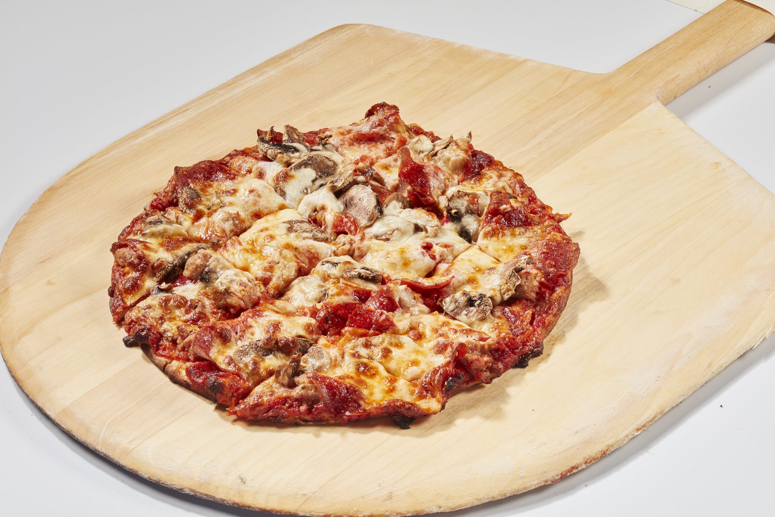 House Special -Sausage, Pepperoni, mushrooms Thin Crust Pizza