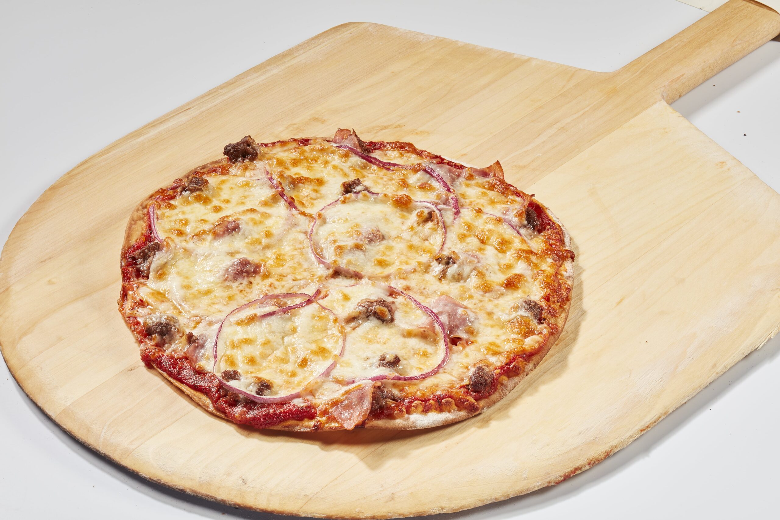 Jakeenos Favorite Minneapolis Thin Crust Pizza - Ground Beef, Canadian Bacon, Onions.